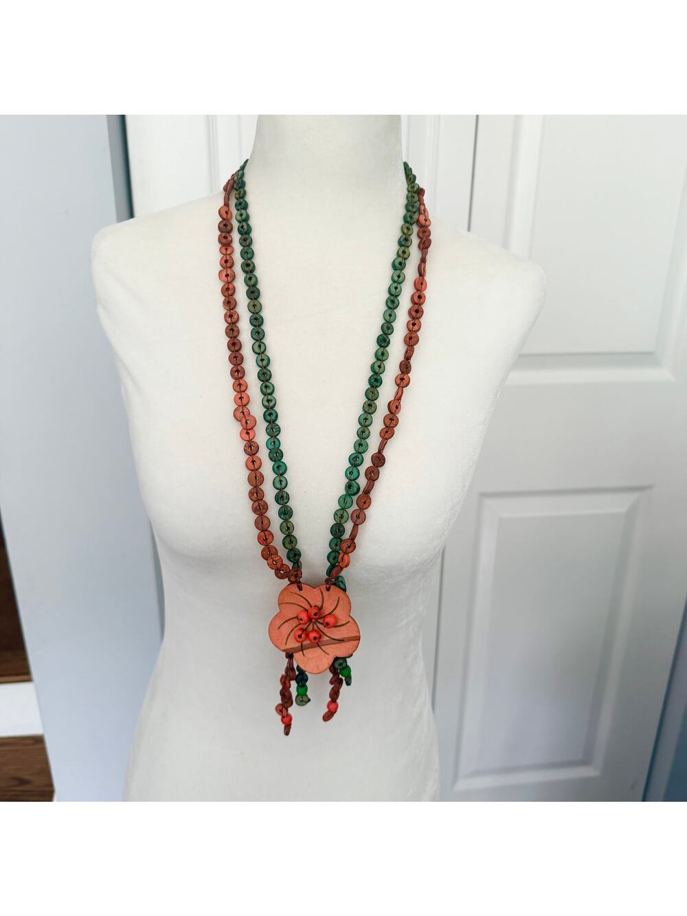 Handmade wood floral pendant orangey green beaded tropical statement necklace